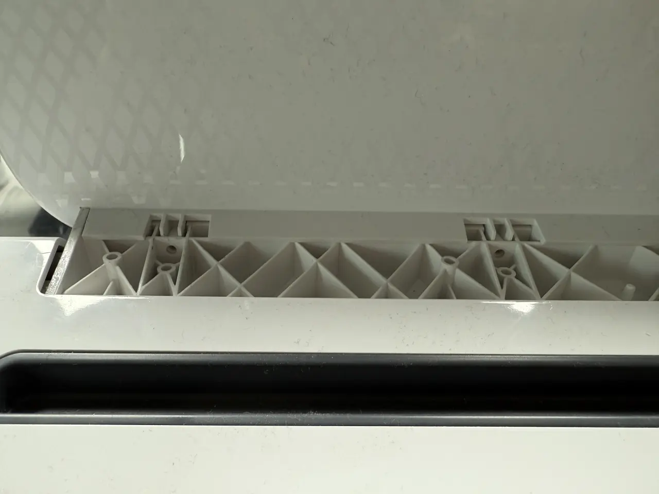 Image of the lid screws removed